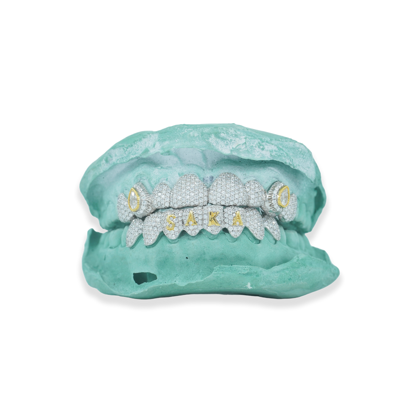 Custom Iced Out Grillz W/ Pear Cut Stones on Fang