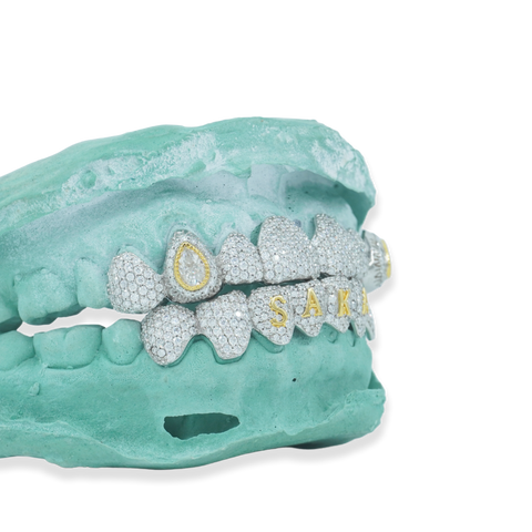 Custom Iced Out Grillz W/ Pear Cut Stones on Fang